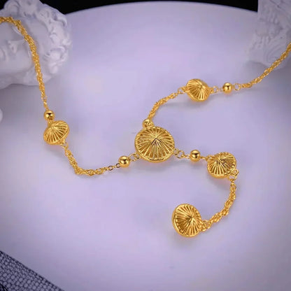 Gold Circle Tassel Necklace